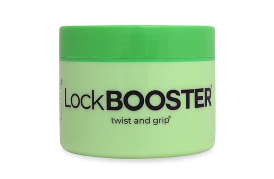 A green container of hair styling product.