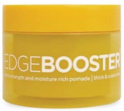 A yellow container of edge booster hair pomade.